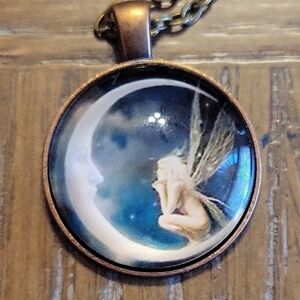 Mystical Fairy Gold Blue Pendant Necklace set in copper tone setting long chain